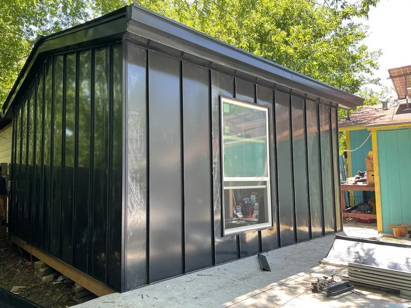 Black standing seam metal wall panels for Roof Inspection in Pine Hills