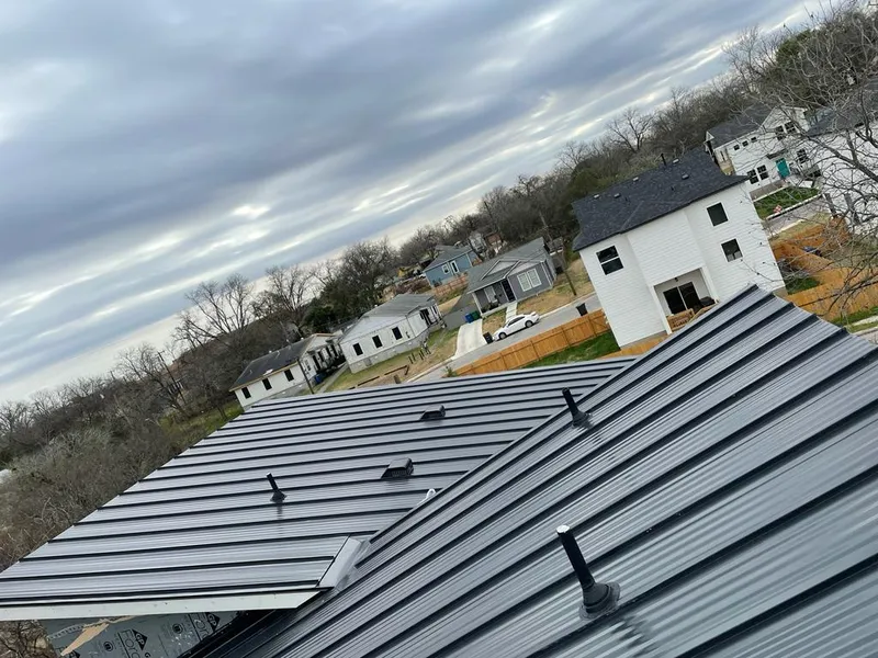 Standing seam metal roof panels with vents for Skylight Repair in Pine Hills